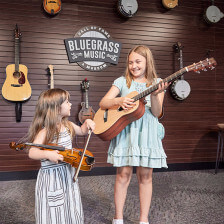 Children playing instruments at Kentucky's Bluegrass Hall of Fame & Museum
