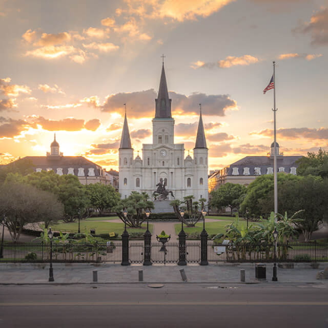 Sun rays frame St. Louis Cathedral in New Orleans, Louisiana