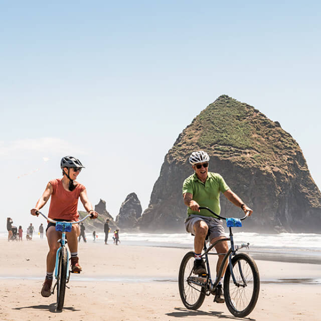 Biking along the shore in Cannon Beach, Oregon