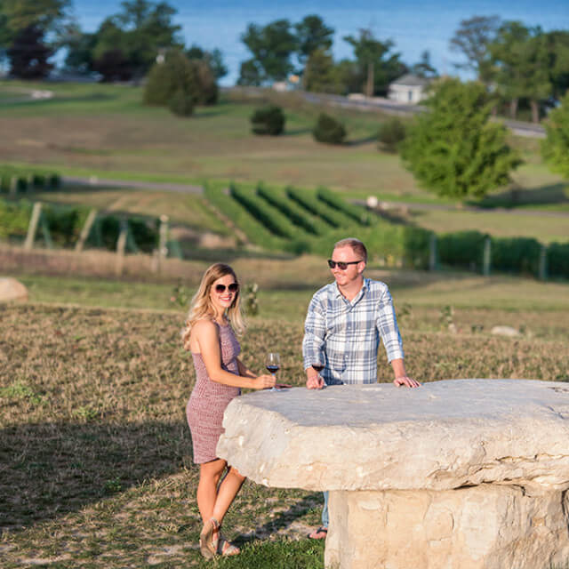 Drinking wine in a vineyard in Traverse City, Michigan