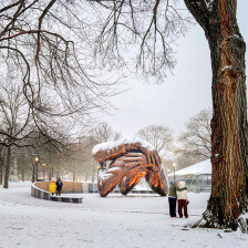 A snowy scene at the Embrace Statue in Boston, Massachusetts