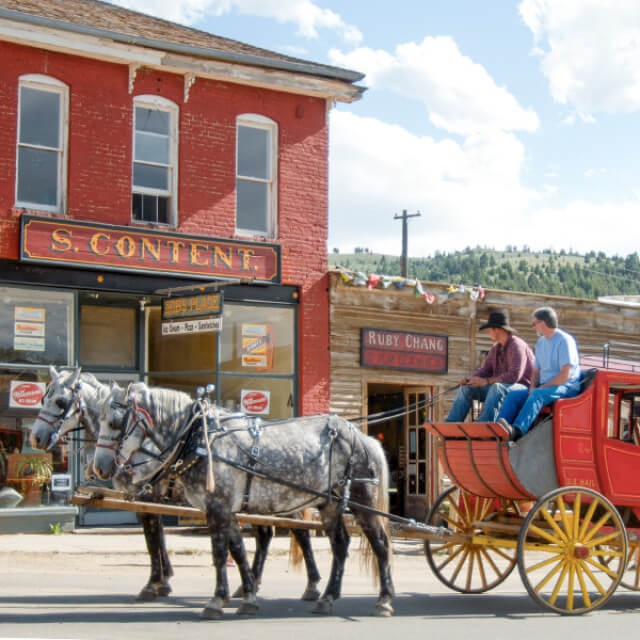 Riding a stagecoach through Virginia City, Montana