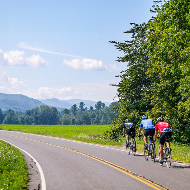Road biking amid mountain scenery in Peru, New York