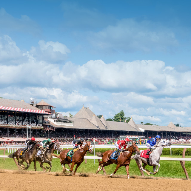 Horses run around Saratoga Race Course in Saratoga Springs, New York