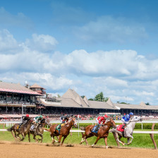 Horses run around Saratoga Race Course in Saratoga Springs, New York