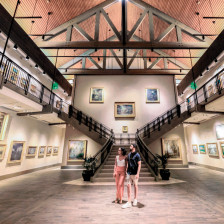 A couple explores the CiCi and Hyatt Brown Museum of Art in Daytona Beach, Florida