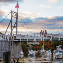 Standing on a bridge above a harbor in Ogunquit, Maine