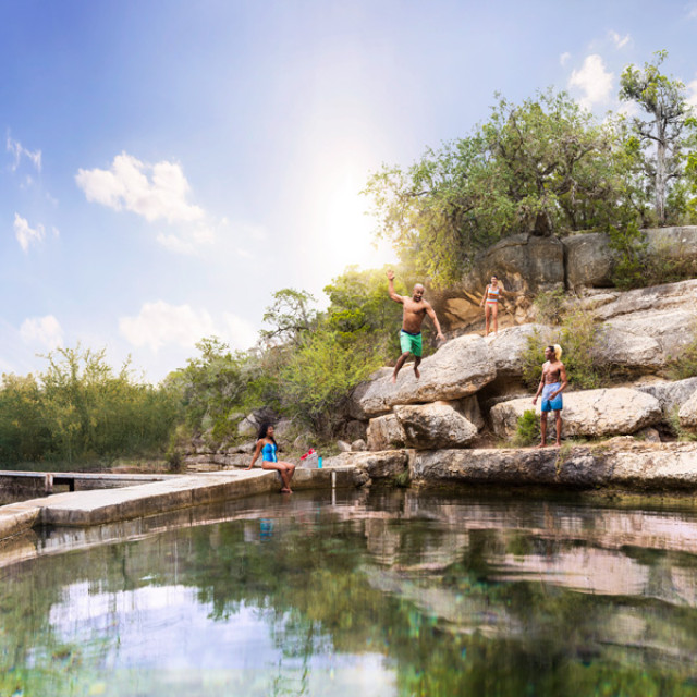 Swimming at Jacob's Well Natural Area in Wimberley, Texas